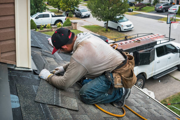 Professional Roofing technician working in Wells Bridge, NY